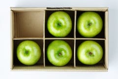 Apple in the box isolated royalty free stock photo Apple in the box isolated royalty free stock photo