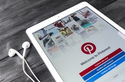 Apple iPad Pro with social Internet service Pinterest on the screen. Pinterest application on tablet computer screen. stock photography Apple iPad Pro with social Internet service Pinterest on the screen. Pinterest application on tablet computer screen. stock photography