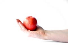 Apple w ręce odizolowywającej na białym tle fotografia stock Apple w ręce odizolowywającej na białym tle fotografia stock