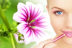 Applying Lipstick Using Lip Concealer Brush Stock Photos