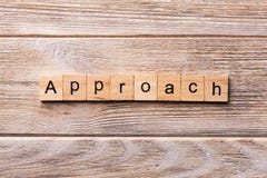 APPROACH word written on wood block. APPROACH text on wooden table for your desing, concept stock photography APPROACH word written on wood block. APPROACH text on wooden table for your desing, concept stock photography