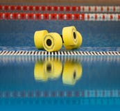 Aqua Aerobics Dumbbells Reflected In Water Stock Photos