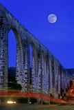 Aqueduct with moon stock image Aqueduct with moon stock image