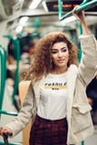 Arabic woman inside subway train. Arab girl in casual clothes. royalty free stock images Arabic woman inside subway train. Arab girl in casual clothes. royalty free stock images