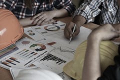 Architect with business man and engineer are planning on blueprint. Architect is pointing on the blueprint. stock image Architect with business man and engineer are planning on blueprint. Architect is pointing on the blueprint. stock image