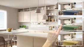 Architect designer concept, hand showing modern wooden kitchen colors in different options, interior design project draft, color royalty free stock photos Architect designer concept, hand showing modern wooden kitchen colors in different options, interior design project draft, color royalty free stock photos