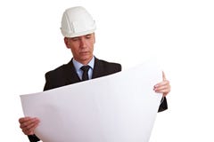 Architect die bouw bekijkt stock afbeeldingen Architect die bouw bekijkt stock afbeeldingen