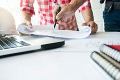 Architects working on blueprint building project together. engineer Team work concept royalty free stock photos Architects working on blueprint building project together. engineer Team work concept royalty free stock photos