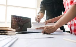 Architects working on blueprint building project together. engineer Team work concept royalty free stock images Architects working on blueprint building project together. engineer Team work concept royalty free stock images