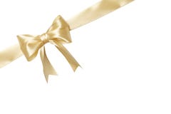 Arco beige del nastro di colore dell'oro isolato su fondo bianco immagini stock Arco beige del nastro di colore dell'oro isolato su fondo bianco immagini stock