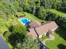 Arial view of a home with a pool stock photo Arial view of a home with a pool stock photo