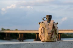 Army water canteen with desert cover Royalty Free Stock Photo Army water canteen with desert cover Royalty Free Stock Photo