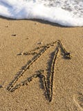 Arrow On Wet Sea Sand Stock Photos Arrow On Wet Sea Sand Stock Photos