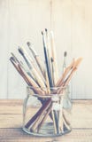 Art and craft tools. On grunge wooden background in high key Royalty Free Stock Image Art and craft tools. On grunge wooden background in high key Royalty Free Stock Image