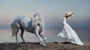 Art photo of the woman with strong horse