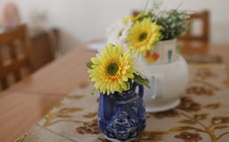 Artificial flowers in vases on the table royalty free stock photo Artificial flowers in vases on the table royalty free stock photo