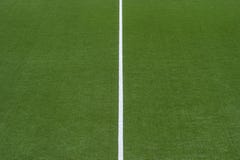 Artificial green turf texture background with white line marks royalty free stock photography Artificial green turf texture background with white line marks royalty free stock photography