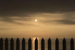 As cercas no por do sol foto de stock As cercas no por do sol foto de stock
