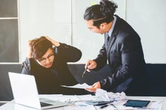 Asian Bad angry boss yelling at business man sad depressed employee reprimand from team leader missed deadline concept royalty free stock photography Asian Bad angry boss yelling at business man sad depressed employee reprimand from team leader missed deadline concept royalty free stock photography