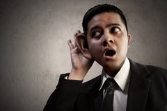Asian business man listening information stock images Asian business man listening information stock images