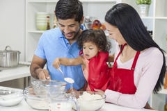Asian Chinese Family Cooking in Home Kitchen royalty free stock images Asian Chinese Family Cooking in Home Kitchen royalty free stock images