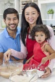 Asian Chinese Family Cooking in Home Kitchen stock photo Asian Chinese Family Cooking in Home Kitchen stock photo