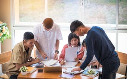 Asian College groups of students using laptop, tablet, studying stock images Asian College groups of students using laptop, tablet, studying stock images