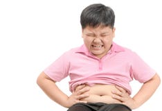Asian fat child suffering from stomachache isolated stock images Asian fat child suffering from stomachache isolated stock images