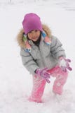 Asian Girl Playing In Snow Stock Image