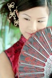 Asian girl in red Chinese dres
