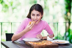 https://thumbs.dreamstime.com/t/asian-lady-sit-table-eating-pizza-wooded-plate-lunch-outdoor-restaurant-asian-lady-eating-pizza-108145462.jpg