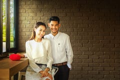 Asian Lover man and woman enjoy with cup of coffee in coffee s royalty free stock photography Asian Lover man and woman enjoy with cup of coffee in coffee s royalty free stock photography