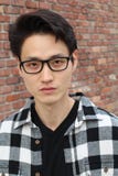 Asian male showing neutral expression closeup royalty free stock photography Asian male showing neutral expression closeup royalty free stock photography