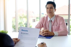 Asian man in job interview at office background, job search, bus stock images Asian man in job interview at office background, job search, bus stock images