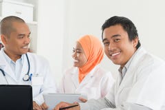 Asian medical team meeting at hospital office. stock photography Asian medical team meeting at hospital office. stock photography