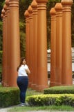 Asian pretty smiley face fat woman pose walking and hold a booklet. Royalty Free Stock Photo Asian pretty smiley face fat woman pose walking and hold a booklet. Royalty Free Stock Photo
