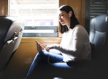 Asian woman riding a train stock photos Asian woman riding a train stock photos