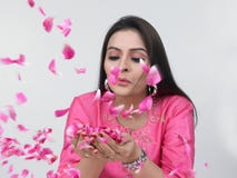 Asian Woman With Rose Petals Royalty Free Stock Images