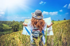 Asian Women Travel Relax In The Holiday. Stand Natural Touch Mountain Field Summer. View Map Travel Explore. In Thailand Royalty Free Stock Photos Asian Women Travel Relax In The Holiday. Stand Natural Touch Mountain Field Summer. View Map Travel Explore. In Thailand Royalty Free Stock Photos