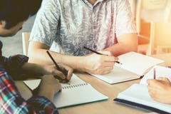 Asian young man,Homosexuality or woman sitting pointing studying examining. Tutor books royalty free stock photography Asian young man,Homosexuality or woman sitting pointing studying examining. Tutor books royalty free stock photography
