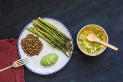 Asparagus with lentils and avocado stock photo Asparagus with lentils and avocado stock photo