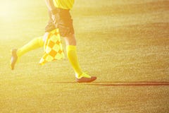 Assistant referee moving along the sideline during a soccer match royalty free stock images Assistant referee moving along the sideline during a soccer match royalty free stock images