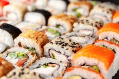 Assorted sushi rolls on black background Stock Photography Assorted sushi rolls on black background Stock Photography