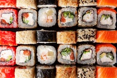 Assorted sushi rolls on black background Stock Photos Assorted sushi rolls on black background Stock Photos