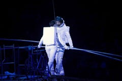 Astronaut dressed performers balance Simet Wheel during Ringling Royalty Free Stock Image Astronaut dressed performers balance Simet Wheel during Ringling Royalty Free Stock Image