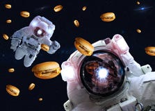 Astronauts in outer space with cheseburgers. Elements of this image furnished by NASA stock photos Astronauts in outer space with cheseburgers. Elements of this image furnished by NASA stock photos