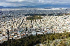 ATEN GREKLAND - JANUARI 20 2017: Fantastisk panorama av staden av Aten från den Lycabettus kullen, Attica arkivfoto ATEN GREKLAND - JANUARI 20 2017: Fantastisk panorama av staden av Aten från den Lycabettus kullen, Attica arkivfoto