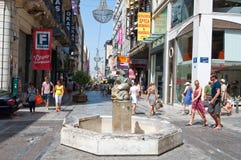ATHENS-AUGUST 22: Shopping on Ermou Street with crowd of people on August 22, 2014 in Athens, Greece. royalty free stock photos ATHENS-AUGUST 22: Shopping on Ermou Street with crowd of people on August 22, 2014 in Athens, Greece. royalty free stock photos