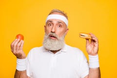 Athlete cool uncertain unsure ponder fit picky grandpa holds for stock images Athlete cool uncertain unsure ponder fit picky grandpa holds for stock images