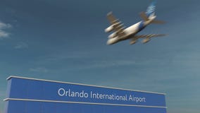 Atterraggio di aeroplano commerciale alla rappresentazione di Orlando International Airport 3D immagine stock libera da diritti Atterraggio di aeroplano commerciale alla rappresentazione di Orlando International Airport 3D immagine stock libera da diritti